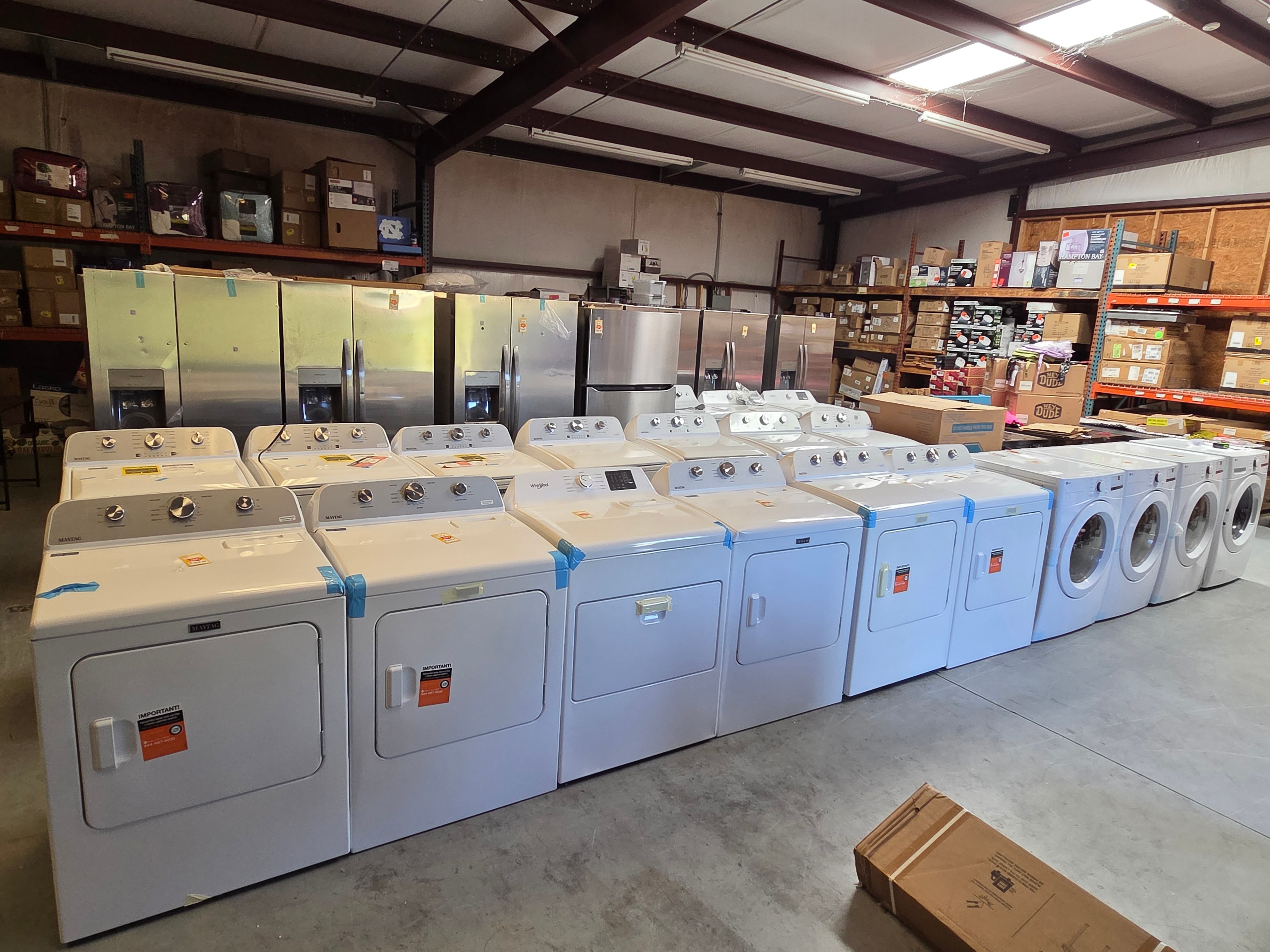 Neal Liquidations warehouse — washers, dryers, and refrigerators