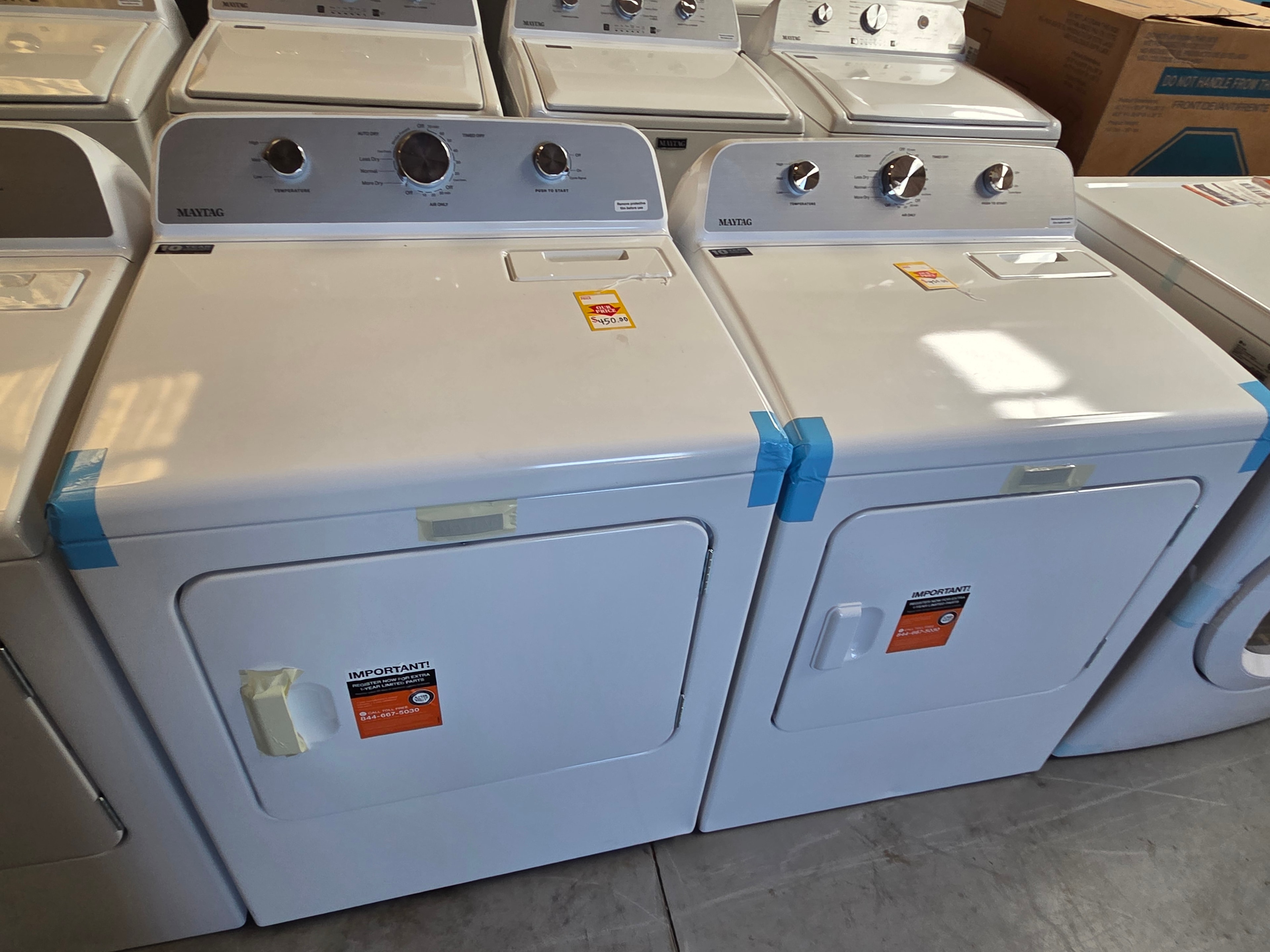Neal Liquidations warehouse — Maytag washer and dryer pair