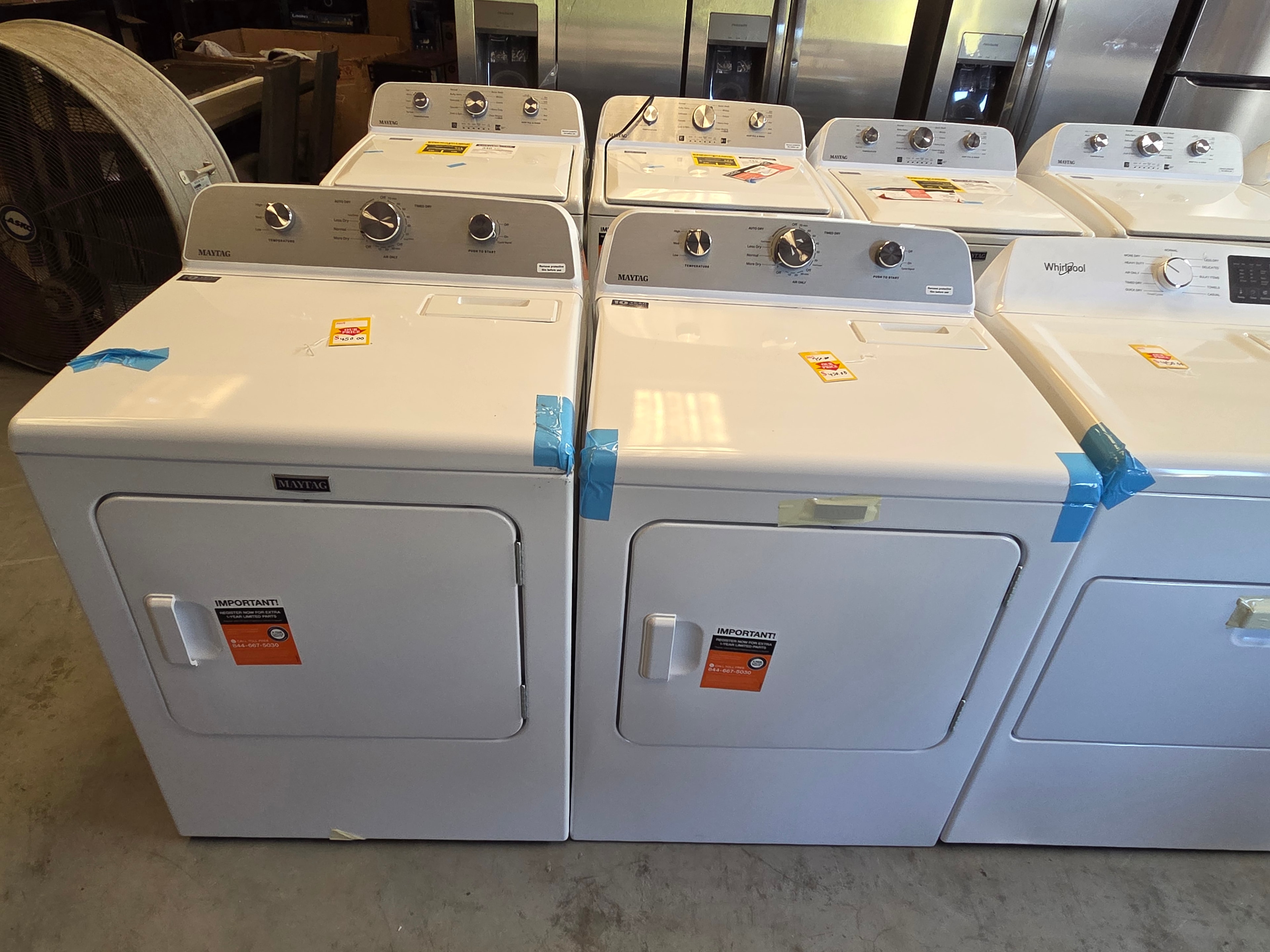 Neal Liquidations warehouse — row of electric dryers
