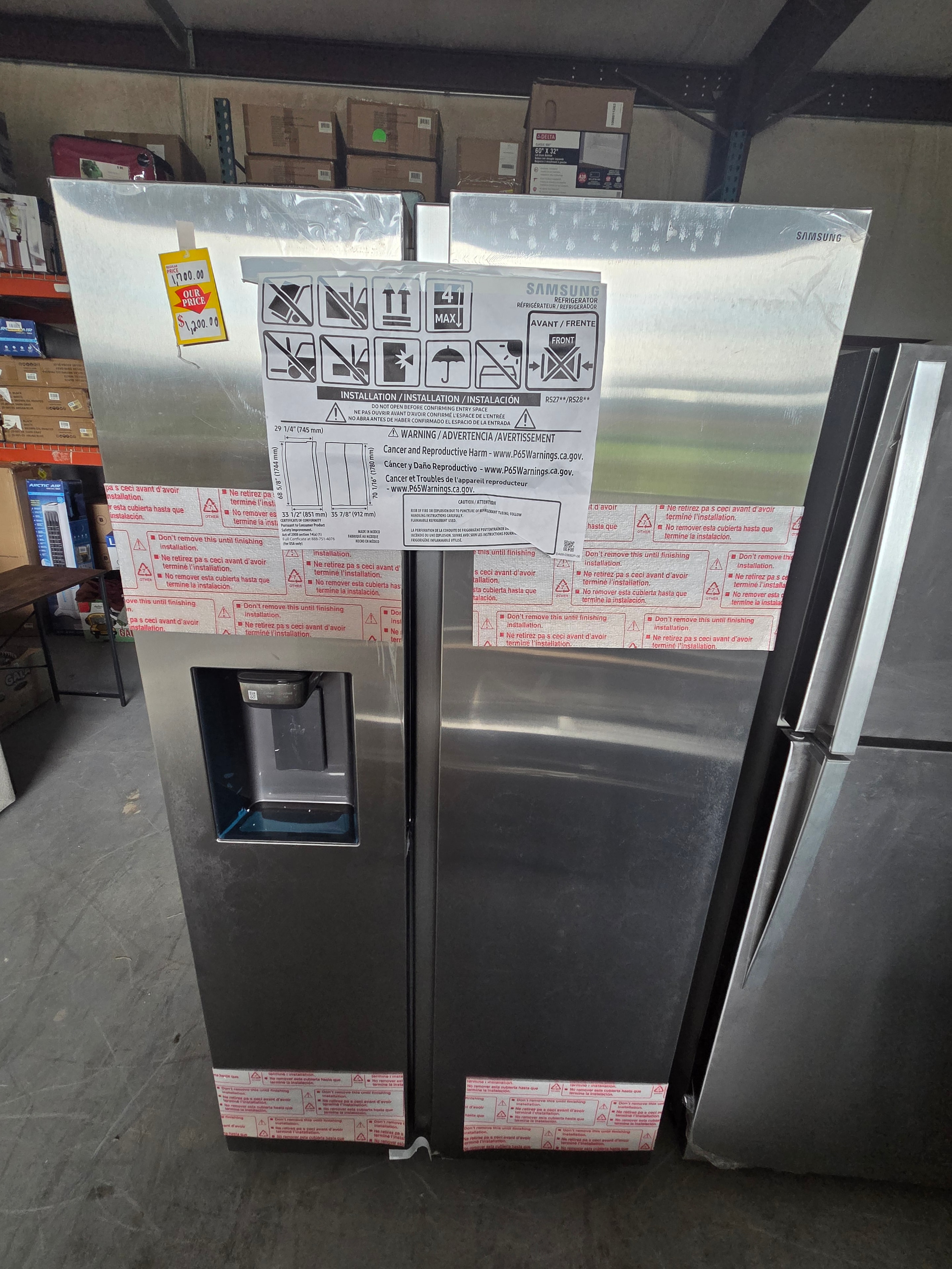 Samsung stainless steel refrigerator with price tag