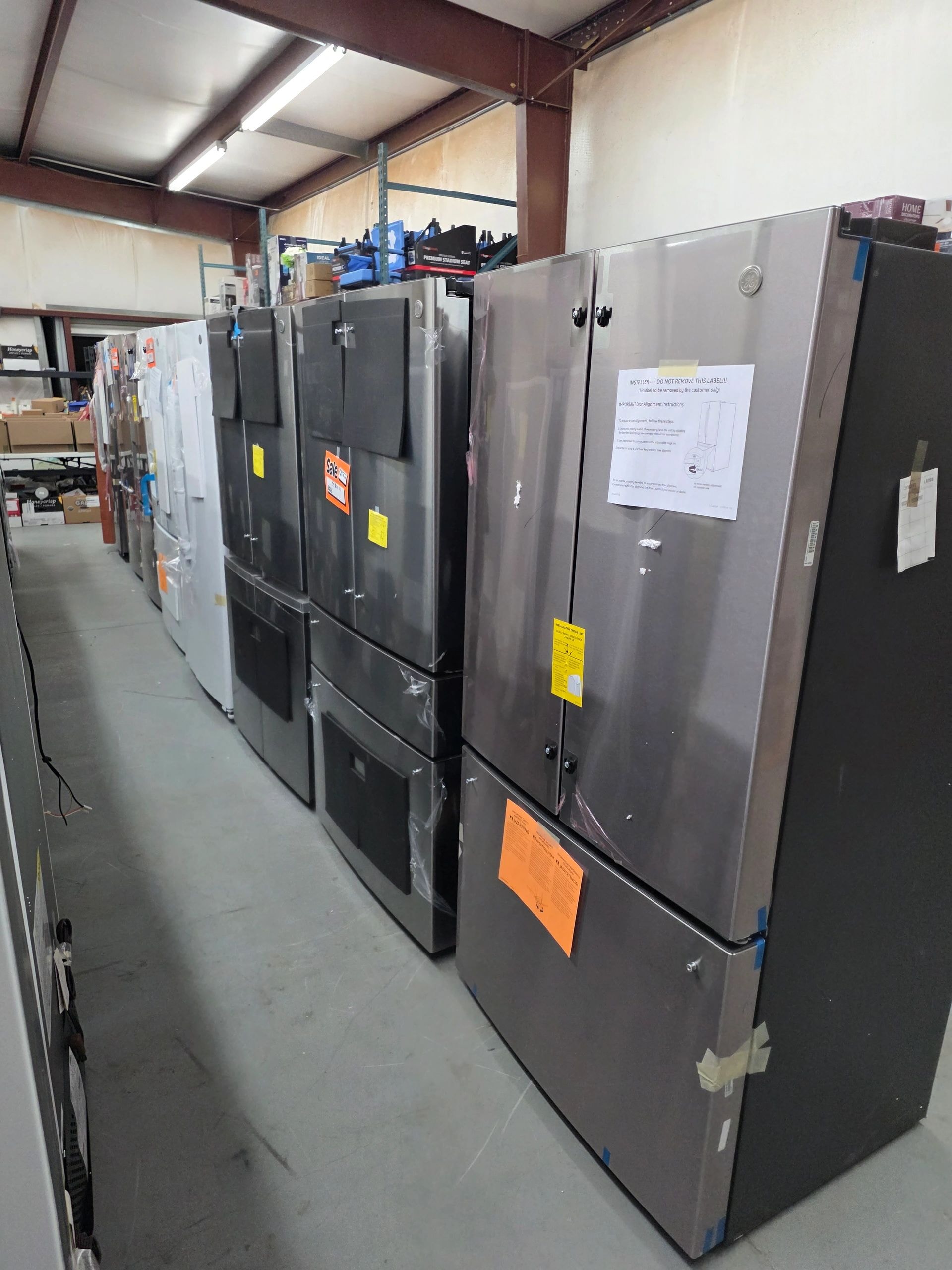 Refrigerators in warehouse